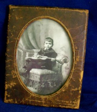 Antique Photo In Leather Frame - Little Boy In Victorian Chair Holding Guitar