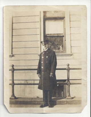 Old Photo Police Officer In Uniform Standing On Street