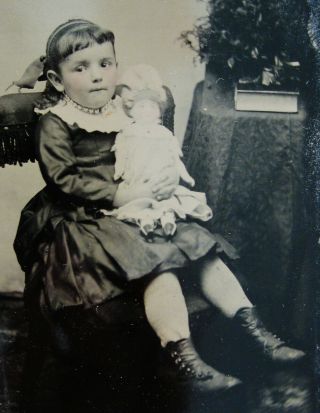 Antique Tintype Photo Portrait Of A Pretty Little Girl Posing With Her Doll