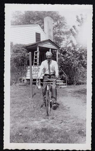 Vintage Antique Photograph Older Man Riding On Bicycle Bike In Front Of House