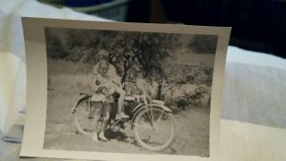 Old Photo Of Kids On A Bike
