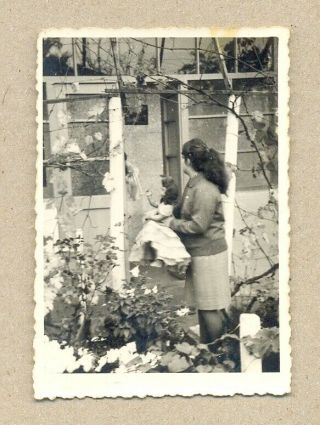 Woman Hold Big Doll In Dress In Garden,  Weird,  Strange - Vintage Photo Snapshot