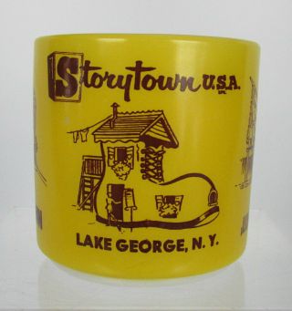 Storytown Usa Mug Lake George Ny Milk Glass Yellow Jungle Land Ghost Town Mug