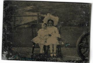 Tintype Photograph Two Little Girls Seated On Chair,  River Painted Back Drop