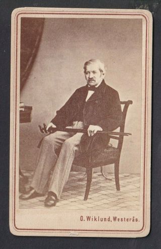 Cdv - Norway,  Man In Chair Holding Canes - Photo O.  Willund,  Westeras