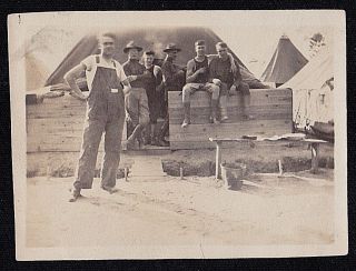 Antique Vintage Photograph Man In Overalls W/ Military Men Sitting On Wall
