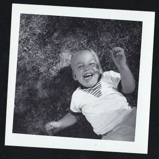 Old Vintage Antique Photograph Adorable Little Boy Laying On Ground Laughing