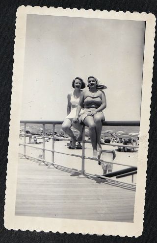Antique Photograph Two Sexy Women In Bathing Suits Sitting On Rail At The Beach