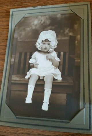 Vintage Sepia Photo Of Little Girl In Bonnet Hat/dress Sitting On Bench - 1930 