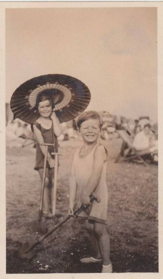 Vintage Photo Children On The Beach With Spades And A Parasol C.  1920s