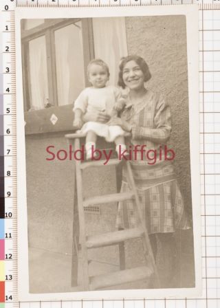 Vintage Photograph,  Woman & Young Child Sitting On A Step Ladder Outside A House