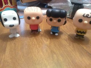Set Of 4 Mini Peanuts Funko Pop Characters - Lucy,  Snoopy,  Linus,  Charlie Brown