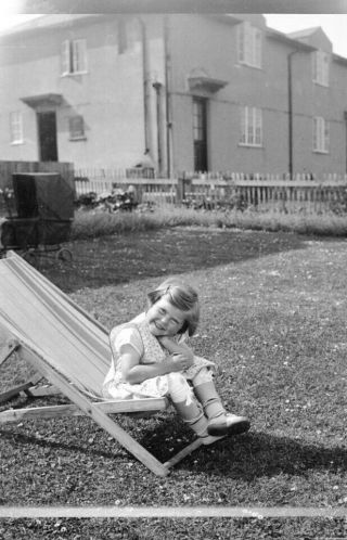 Old Negative.  A Little Girl Sitting In A Deck Chair.  C1910