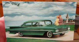 1959 Chevrolet Bel Air 4 Door Sedan Auto Car Advertising Postcard