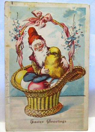 1910 Postcard Easter Greetings,  Gnome Elf In Basket Of Colored Eggs With Chick