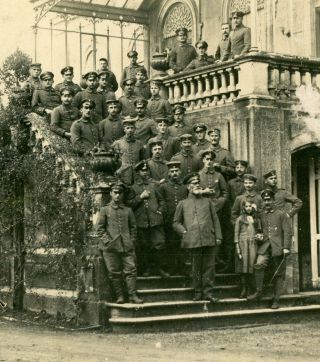 RPPC - European Soldiers Posed on Steps & Balcony of Bldg. ,  Writing on Back 2