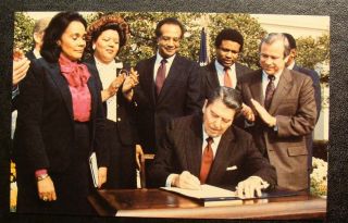 1983 Black American Postcard - President Reagan Signs King Holiday With Widow