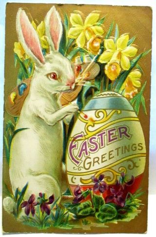 1909 Postcard Easter Greetings,  White Bunny Painting And Easter Egg