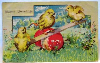 1910 Postcard Easter Greetings,  3 Chicks On See - Saw,  Red Egg