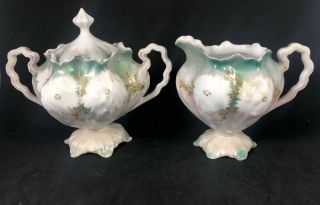 Set Of Antique Marked Rs Prussia Cream And Sugar White Flowers Gold And Green 9c