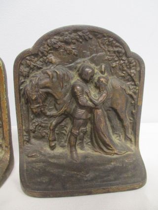 ANTIQUE CAST IRON BOOK ENDS with ROBIN HOOD MAID MARION LOVERS BY HORSE 2