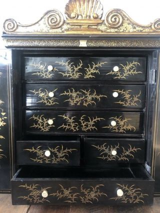 A Chinese Export Black Lacquered And Gilt Decorated Collector’s Cabinet 6