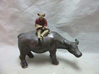 Vintage Mud Man Figuring Riding An Ox