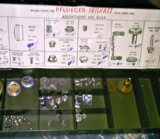 Vintage Pflueger Skilcast Casting Reel Repair Parts In Metal Box