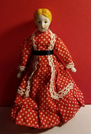 7.  5 " Antique Porcelain Doll,  Porcelain Head,  Hands,  & Foots Cloth Body