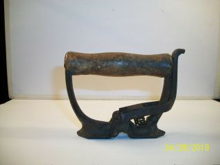 Antique: 1880s - 1890s Cast Iron Spring Action Wooden Handle.  For Sad Iron.