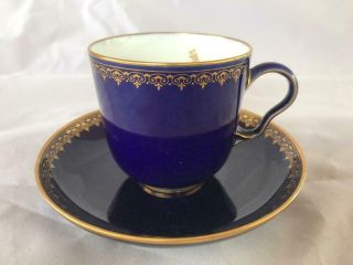 Antique French Sevres Porcelain Cobalt Blue And Gilded Cup And Saucer.