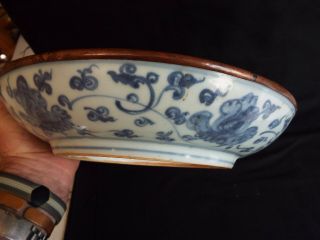 Large antique Chinese blue white porcelain shallow bowl with copper rim. 12