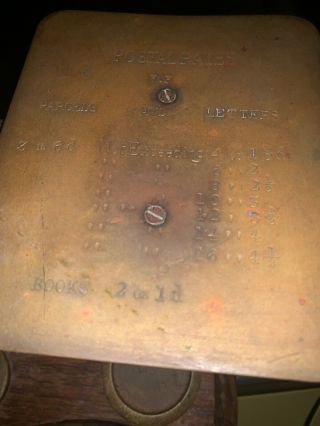 Antique Postal Scale with 4 weights.  Needs Dusting And Polishing.  Cool 5