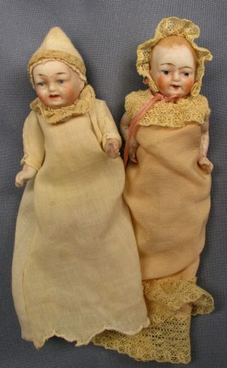 Two Antique German All Bisque Babies,  One Smiling,  One Crying