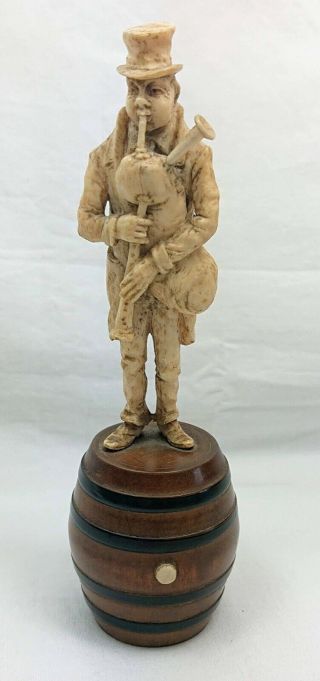 19th Century European Carved Bovine Bone Figure Of A Bagpipe Player On Barrel