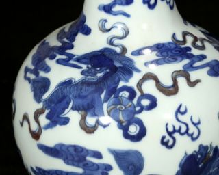 Antique Chinese Blue and White Lion Porcelain Vase with Kangxi Mark 6
