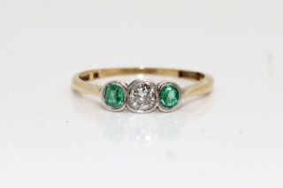 A Fine Antique Art Deco 18ct & Plat 0.  10ct Diamond & Emerald Three Stone Ring