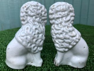 PAIR: 19thC STAFFORDSHIRE POODLE DOGS WITH BASKETS IN MOUTHS c1880s 8