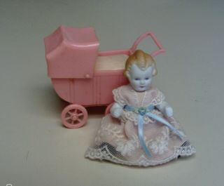 Vintage German Jointed Bisque Doll Penny Doll And Renwal Pink Carriage