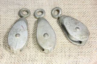 3 old Pulleys with swivel eye 7/8” cast iron wheel vintage galvanized rustic 3