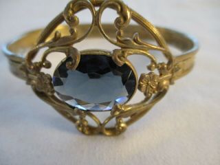Antique Gold Tone Bangle Bracelet With Blue Stone Has Flowers And Leaves Ornate