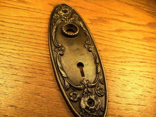 Metal Oval Door Plate.  Escutcheon.  Ornate Detail.