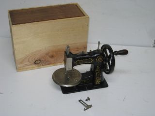 Antique Cast Iron Stitch Well Hand Crank Toy Sewing Machine With Replaced Box