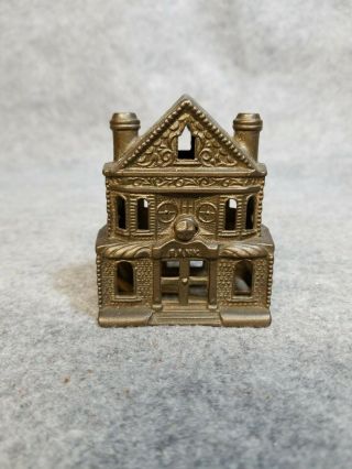 Antique Metal House Bank,  3 1/4 Inches Tall.