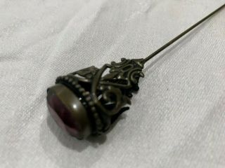 Antique Brass Hat Pin Ornate Repousse Purple Facet Stone Edwardian (ob)