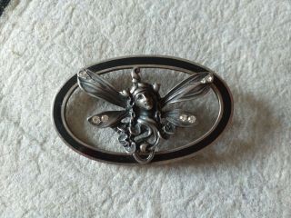 Antique Art Nouveau,  Ari.  C Fairy Head Brooch