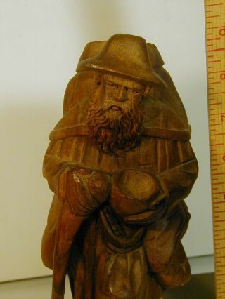vintage carved wood figure man with back pack 2