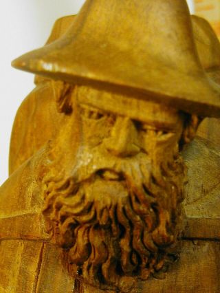 vintage carved wood figure man with back pack 3