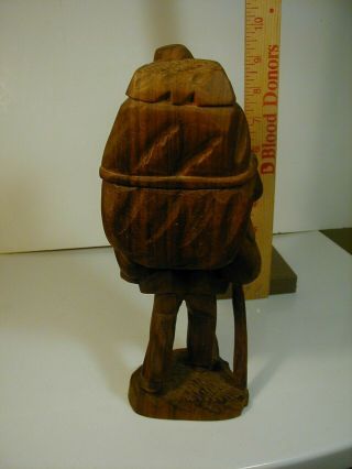vintage carved wood figure man with back pack 4