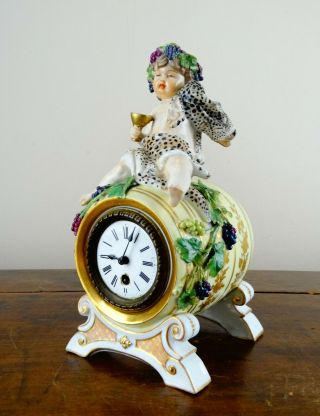 Antique German Dresden Porcelain Figural Mantel Novelty Clock Cherub Drinking